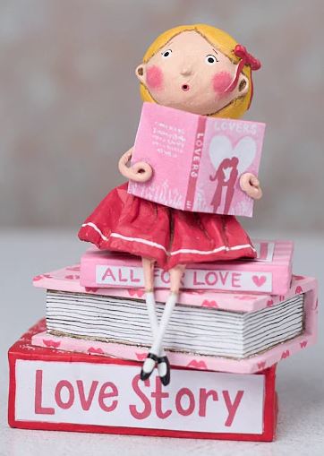 Lori Mitchell Love Story polyresin figurine in a romantic pose with floral accents.