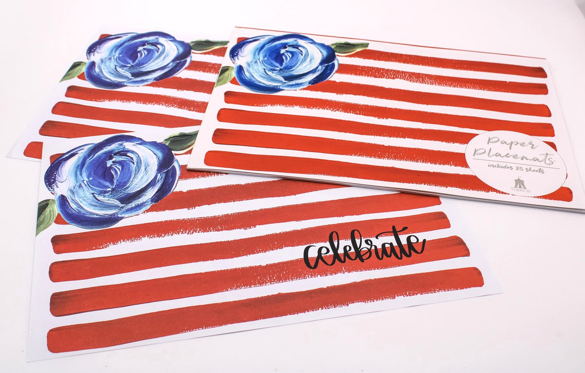 Pad of twenty-five paper placemats with a summer celebration theme featuring colorful floral and fruit patterns on white background.