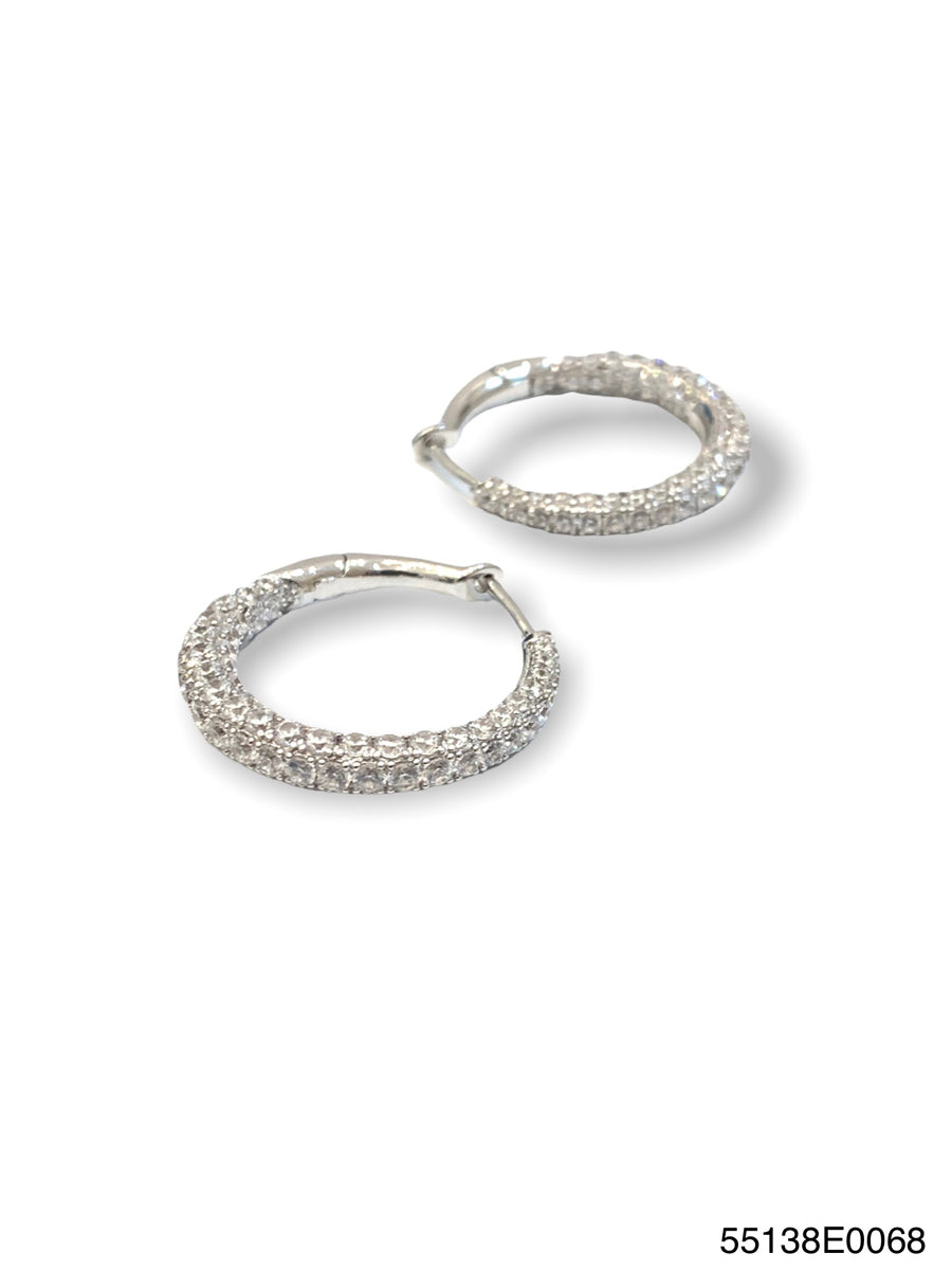 Lara Inside Out hoop earrings featuring a two-tone gold finish with an open circular silhouette and contrasting inner band.