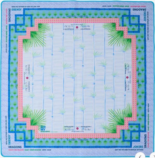 Acrylic Mahjong tile set featuring red, green, white dragons with bamboo, dot, and character suits on a palm-themed mat.
