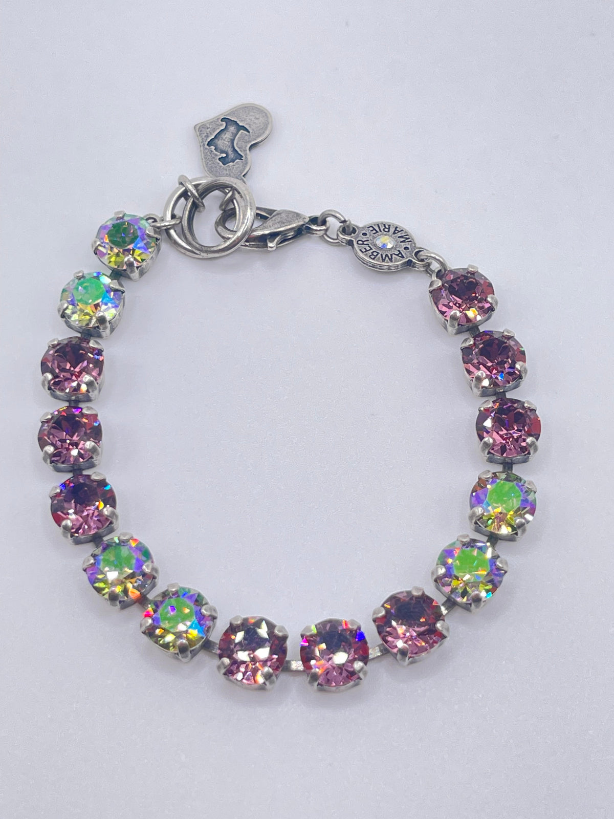 Milan classic bracelet featuring a sleek silver-tone metal band with an elegant curved silhouette and subtle polished finish.