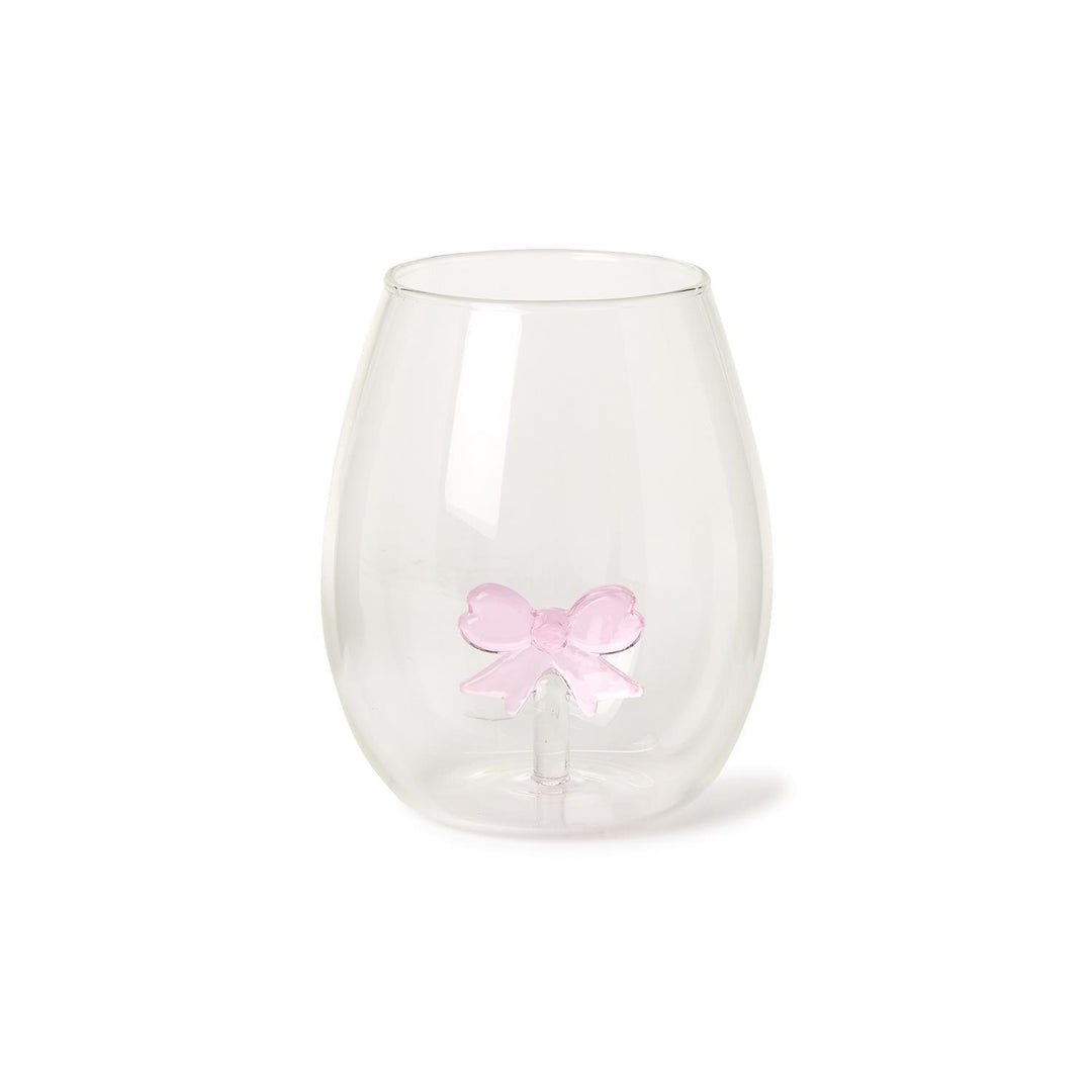 Clear stemless wine glass featuring a small pink 3D glass bow attached to the inside bottom.