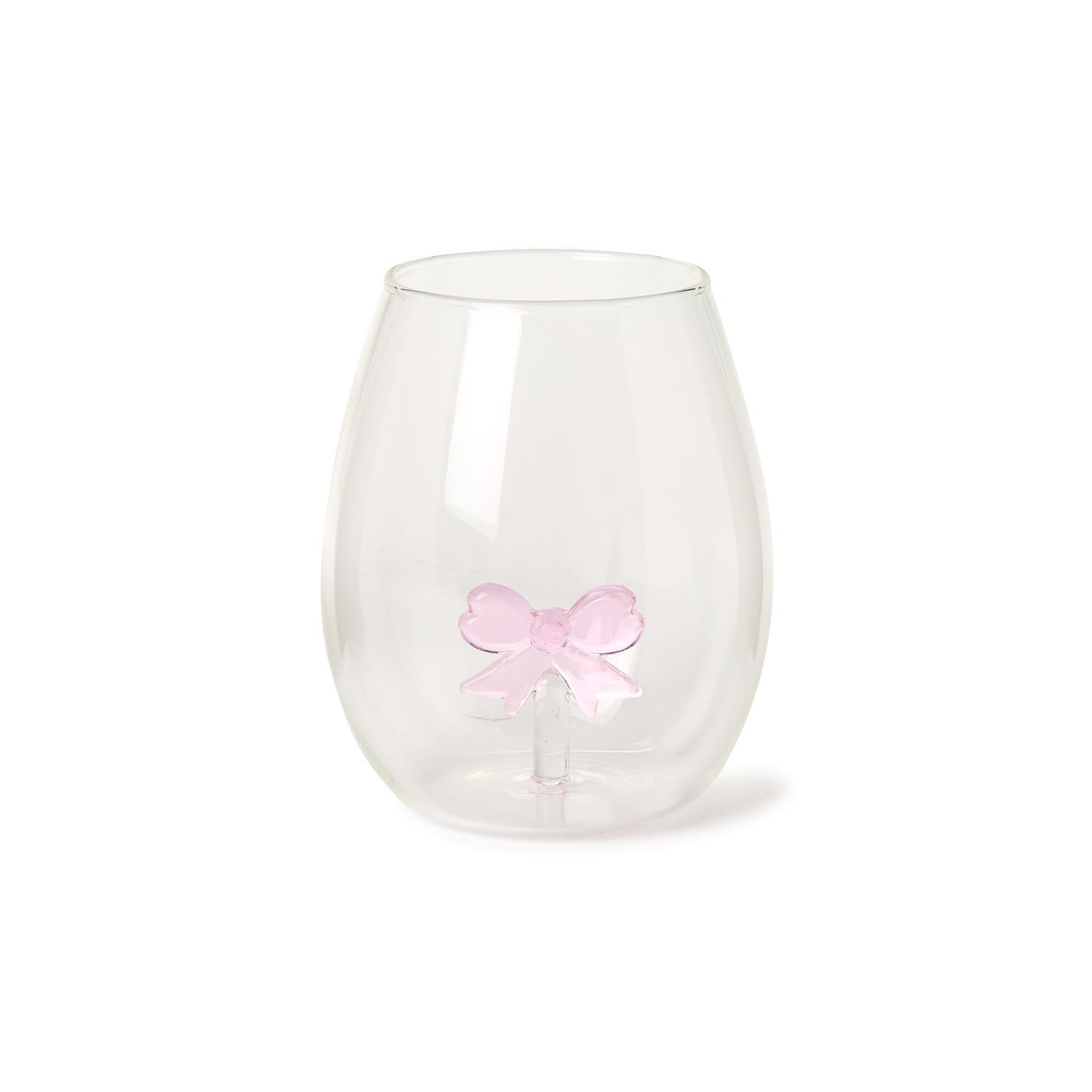 Clear stemless wine glass featuring a small pink 3D glass bow attached to the inside bottom.