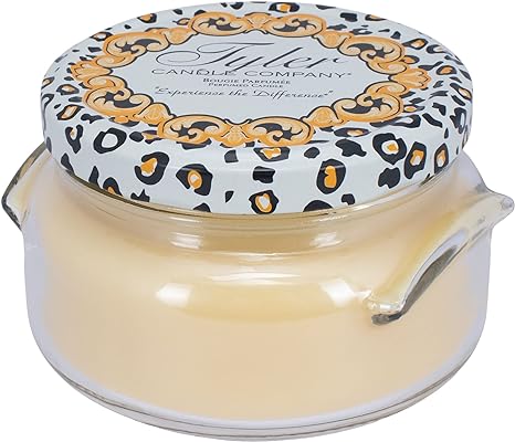 22oz Tyler Candle in a clear glass jar with a leopard print and gold filigree lid.