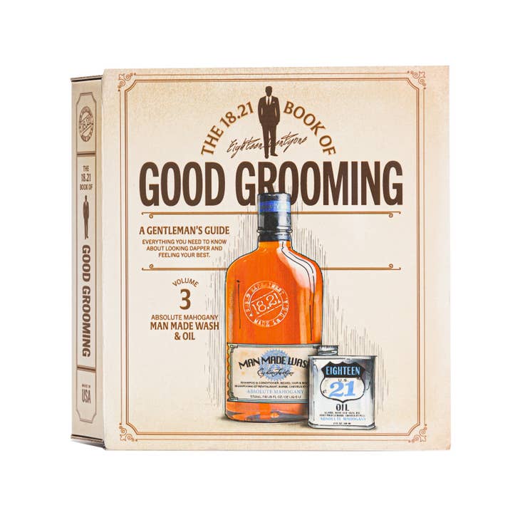 Faux book gift set containing grooming products including wash, conditioner, body wash, and beard oil.