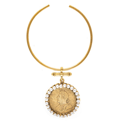 Gold-tone open collar necklace with a pearl-trimmed antique coin pendant.