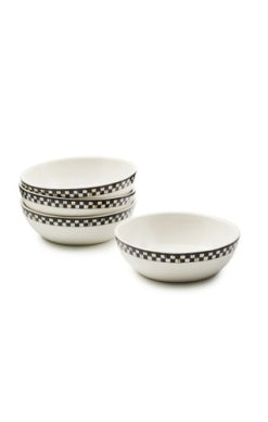 Set of four white ceramic bowls with a black and white checkered rim pattern.