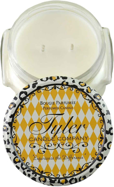 11oz Tyler Candle in a glass jar with a yellow and white diamond patterned lid featuring leopard trim