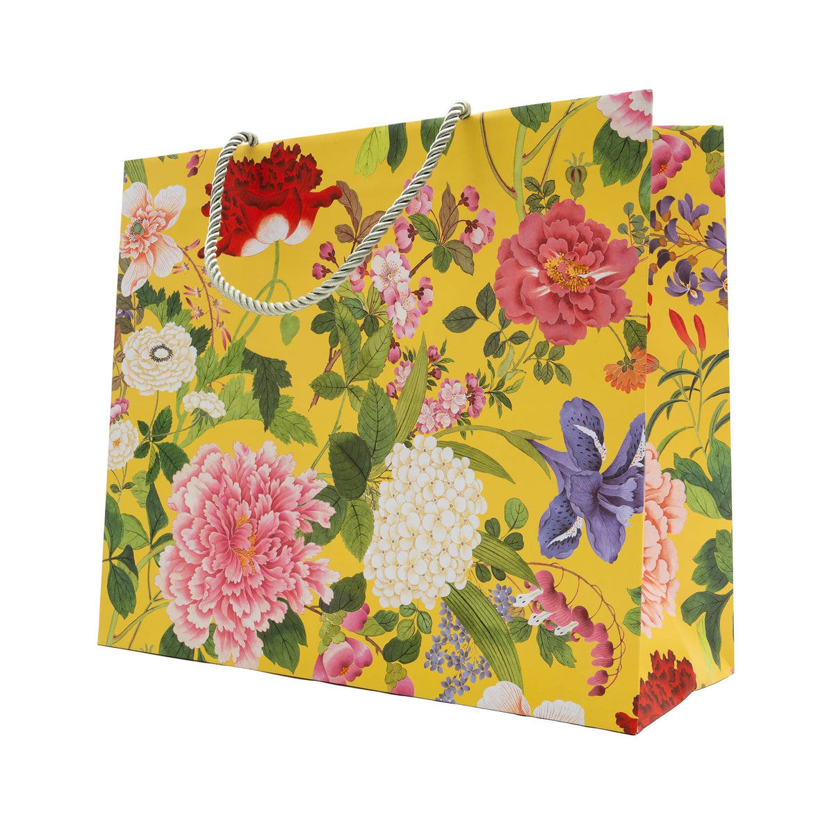 Large yellow horizontal gift bag featuring a vibrant floral pattern and silver rope handles.