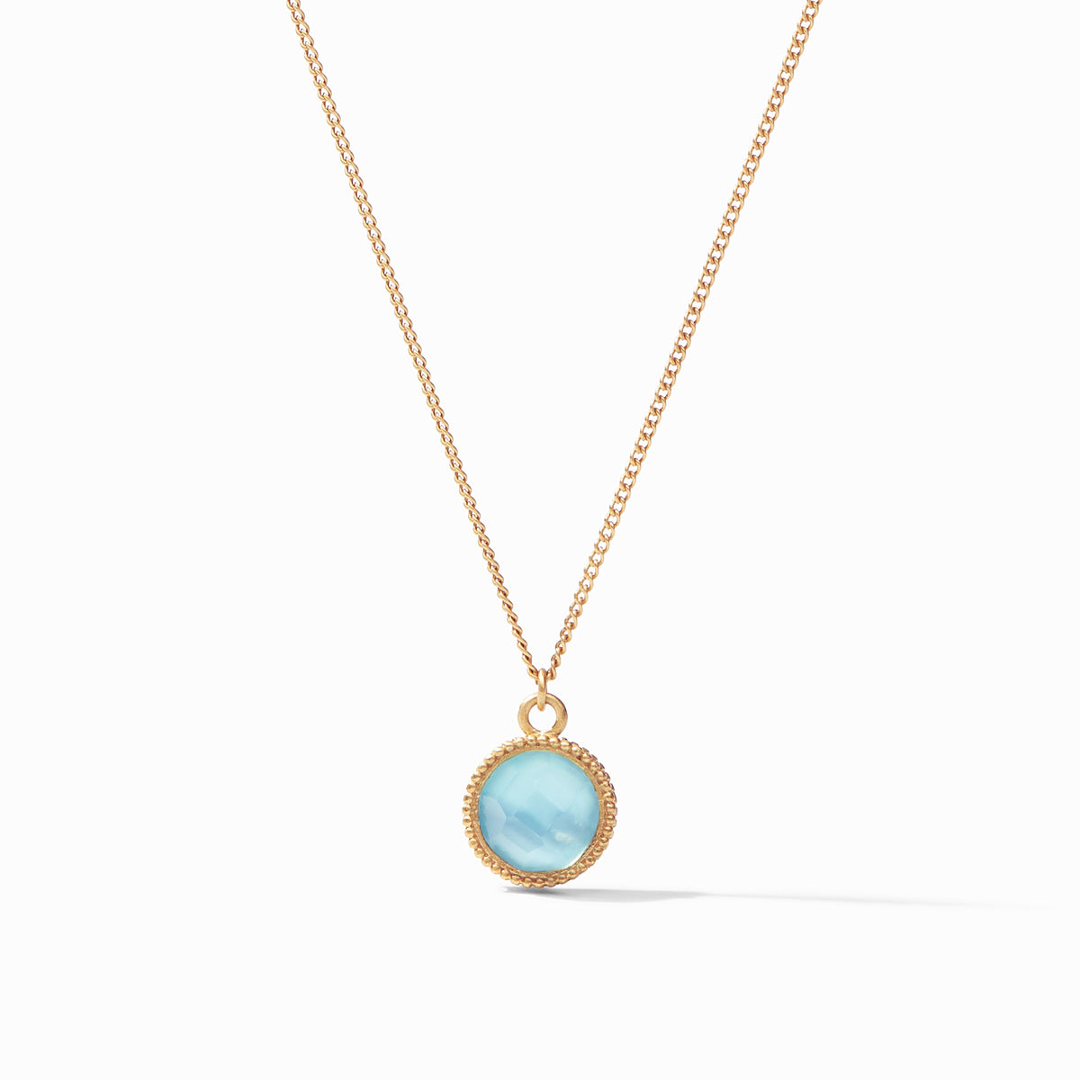 Fleur-De-Lis Solitaire Necklace in 24K gold plate with a round light blue glass pendant.