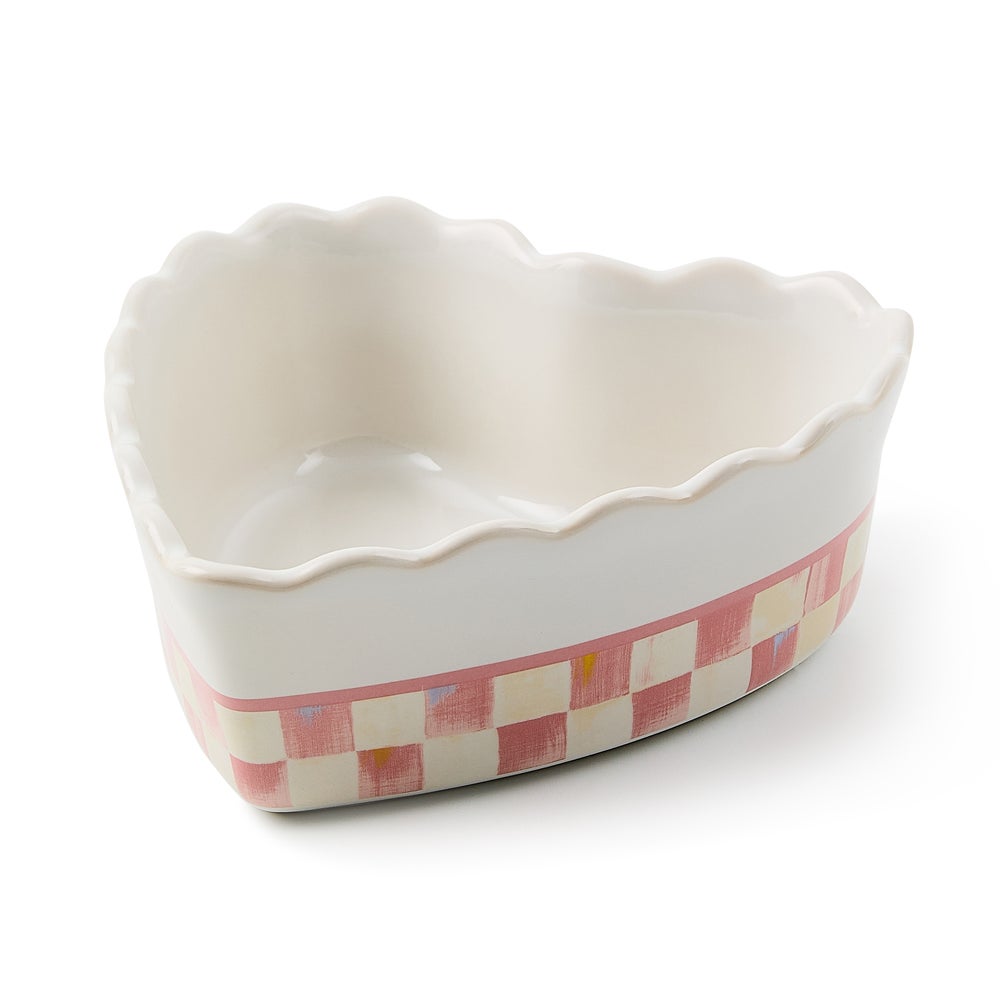 Rosy check stoneware casserole dish with heart-shaped pattern
