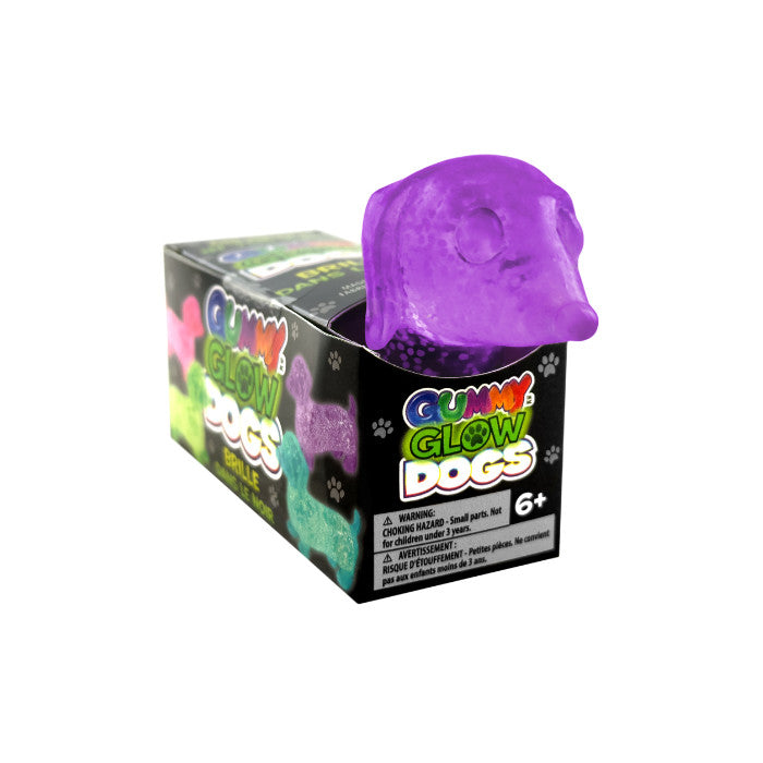 Gummy Glow Dog toy with glowing green gummy bear shape on black background