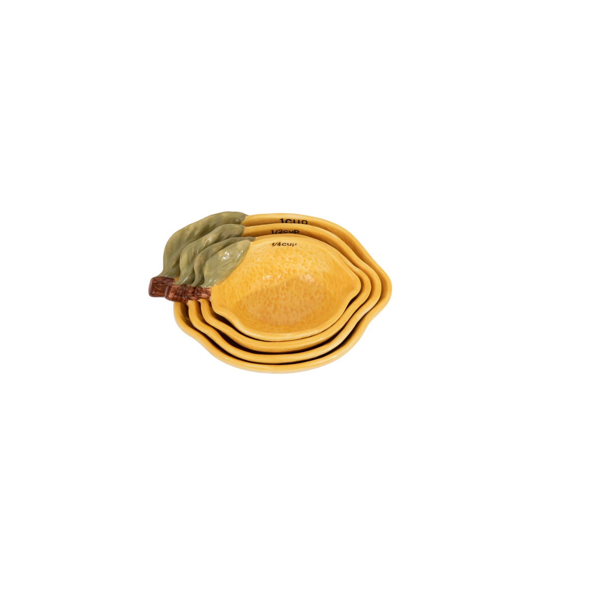 Set of stoneware lemon-shaped measuring cups with a matte finish.