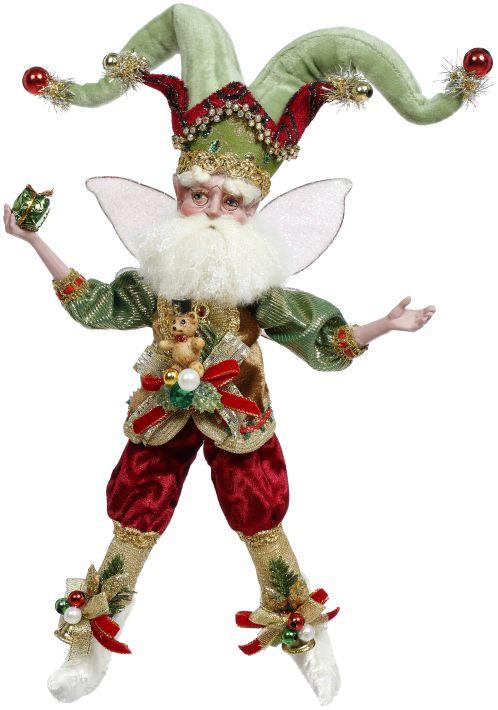 Resin fairy figurine with stocking maker wings in pastel pink and white tones