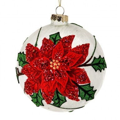 5-inch white glass frost ball ornament featuring a red fabric poinsettia with green holly leaves.