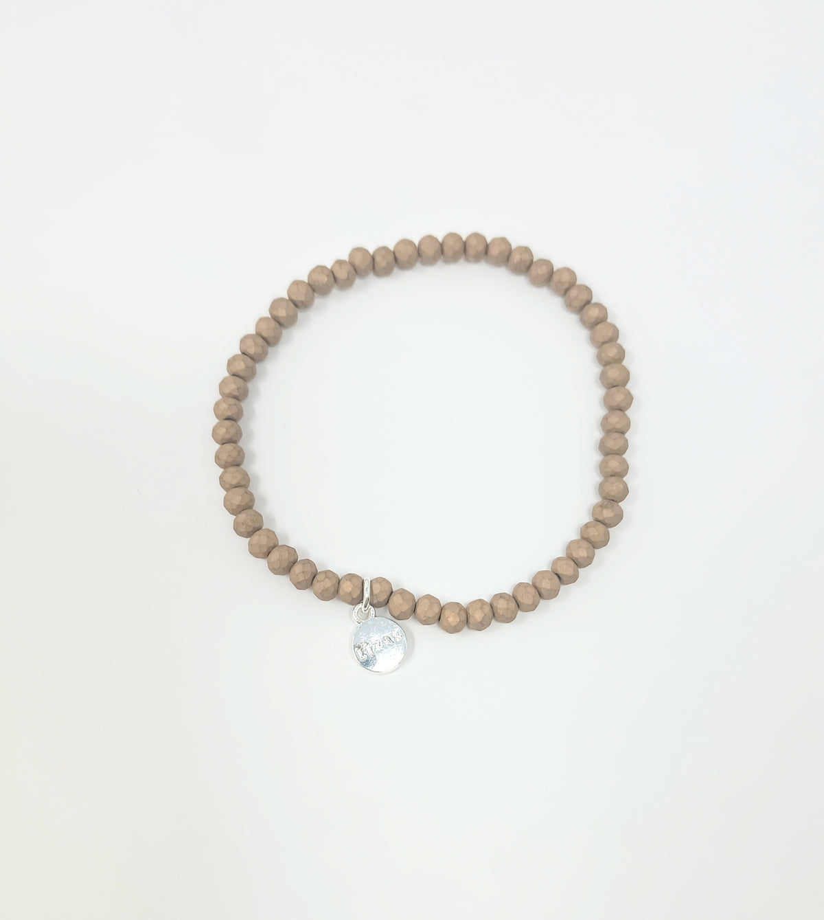 Stretchy bracelet with faceted glass beads in a colorful beaded pattern.