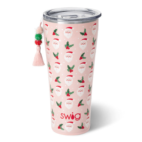 Pink 32oz stainless steel tumbler with a Santa Claus and holly pattern and a decorative tassel.