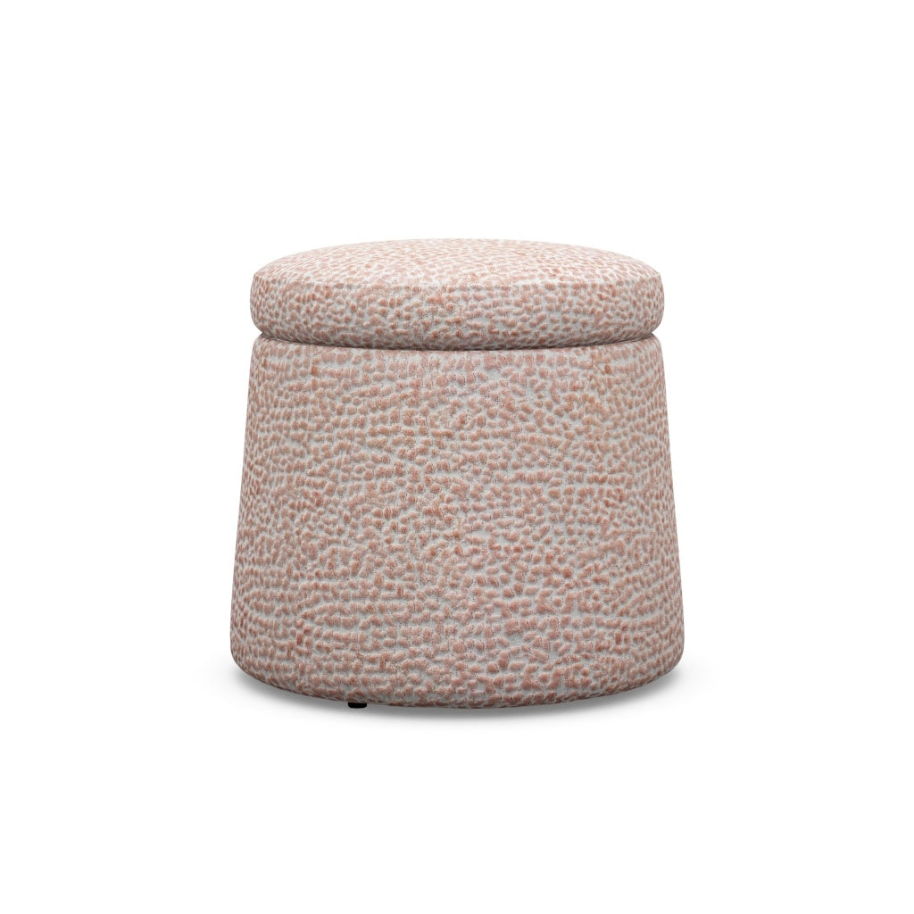Shiloh Ottoman in pink and white textured Jelly Beanz fabric with a round, tapered silhouette.