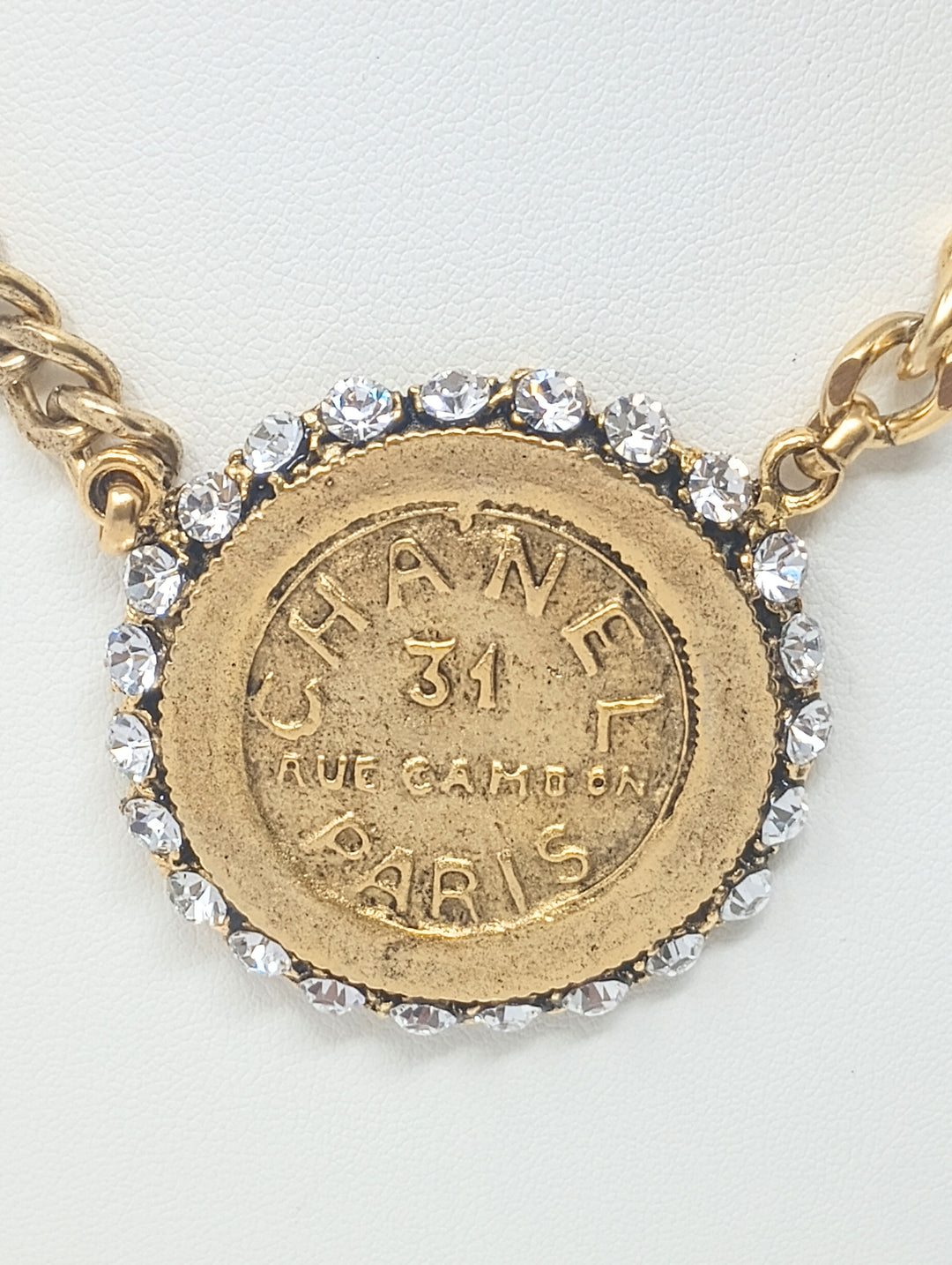 7.5" Gold Chain Necklace with Chanel Type Coin Pendant with Rhinestones