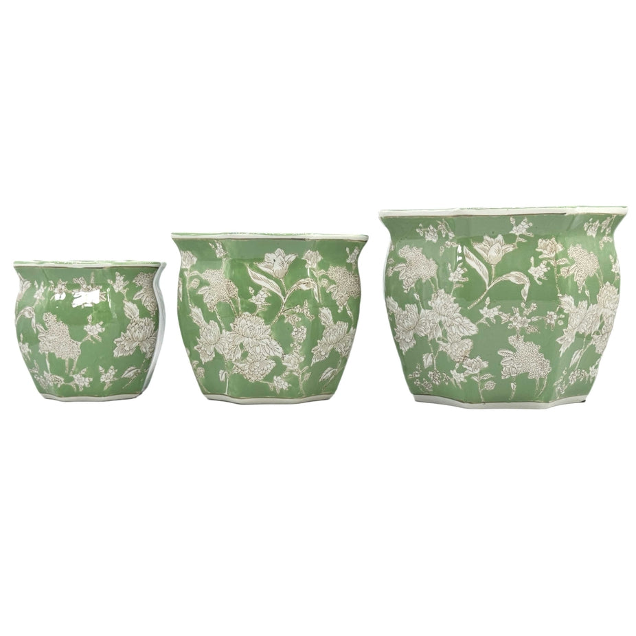 Handcrafted green ceramic planter pot with white fluted detailing